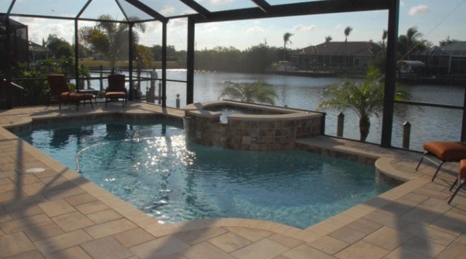 Florida screened pool and spa with waterfront view
